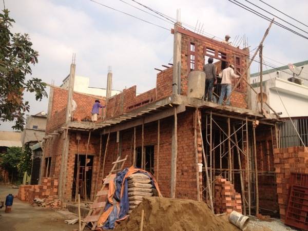 Chiêm bao thấy xây nhà cho cha mẹ